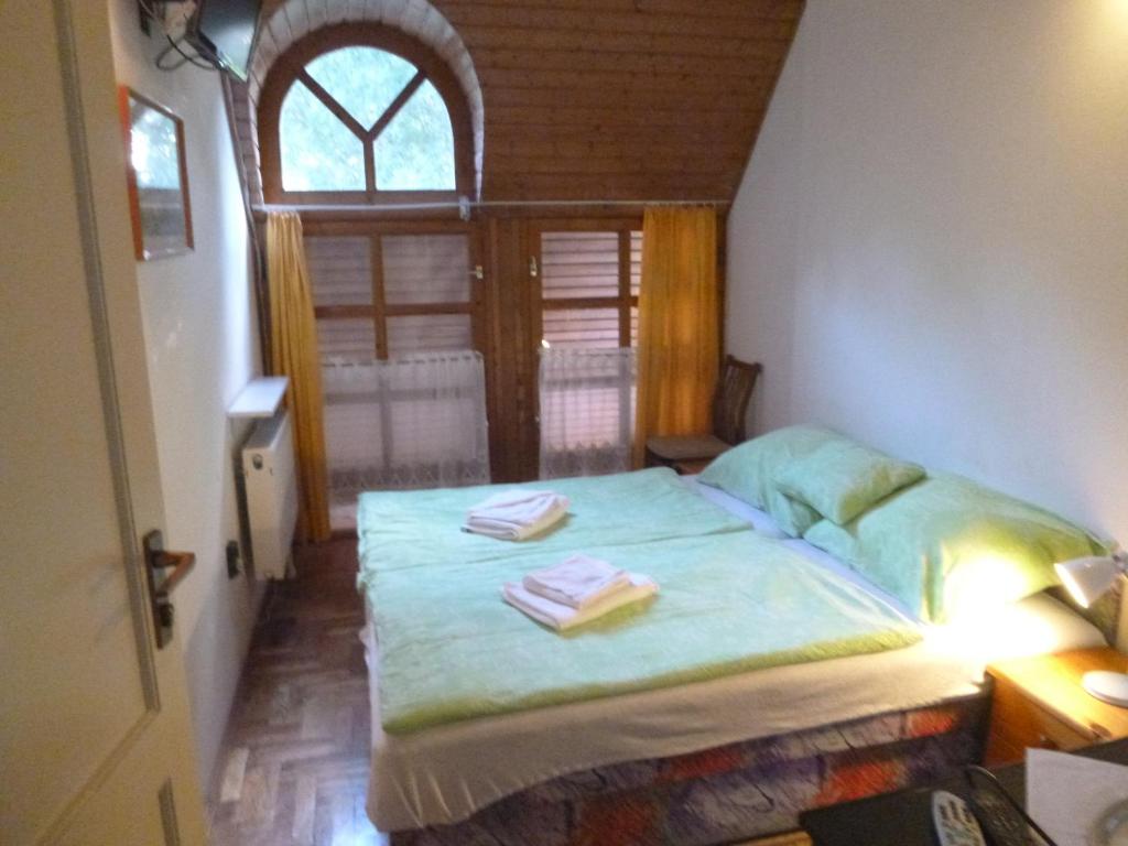 Postel nebo postele na pokoji v ubytování Oleander B&B