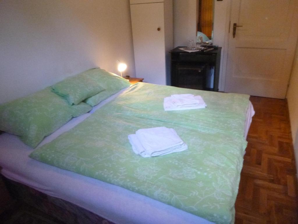 Postel nebo postele na pokoji v ubytování Oleander B&B