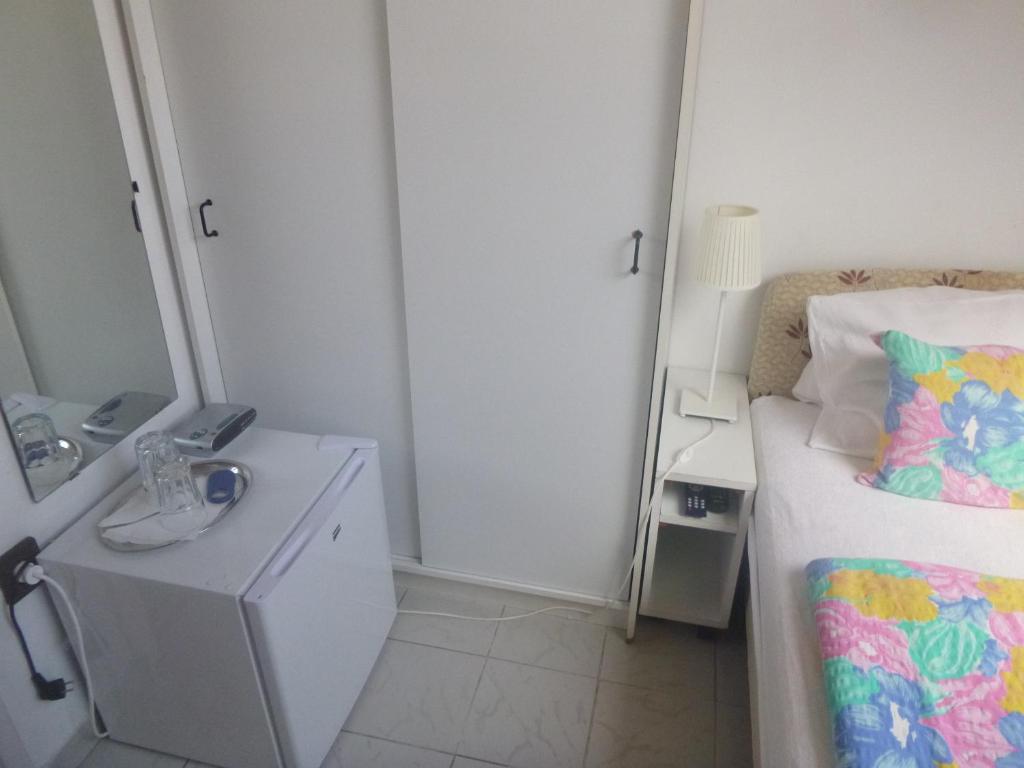 Postel nebo postele na pokoji v ubytování Oleander B&B