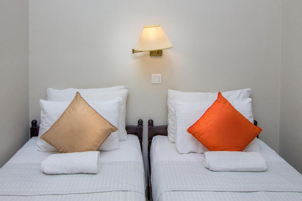 Postel nebo postele na pokoji v ubytování Sevana City Hotel