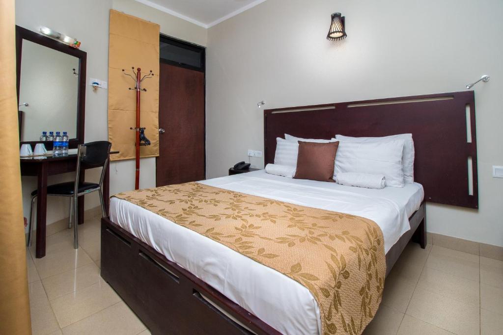 Postel nebo postele na pokoji v ubytování Sevana City Hotel