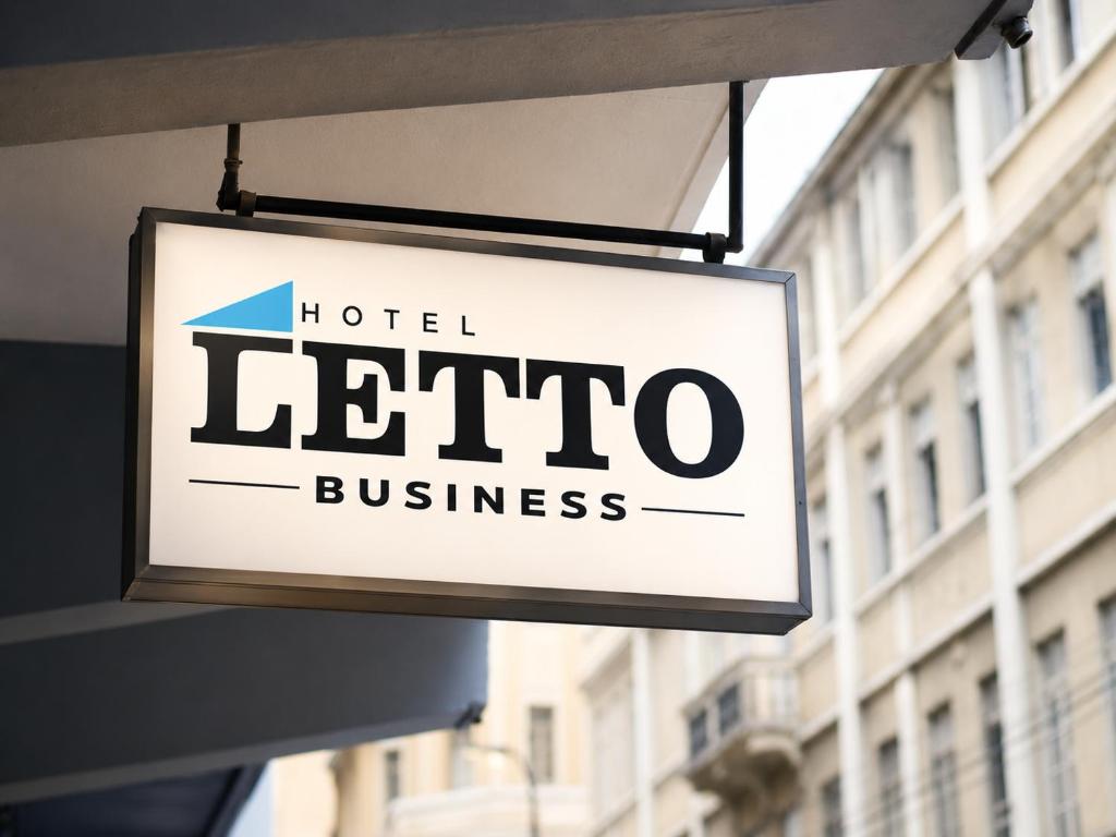 a sign for a hotel erato business hanging from a building at Letto Business in Porto Alegre