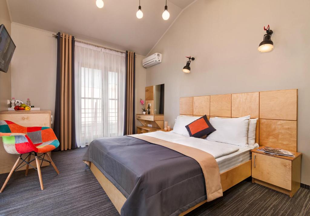מיטה או מיטות בחדר ב-Etude Hotel