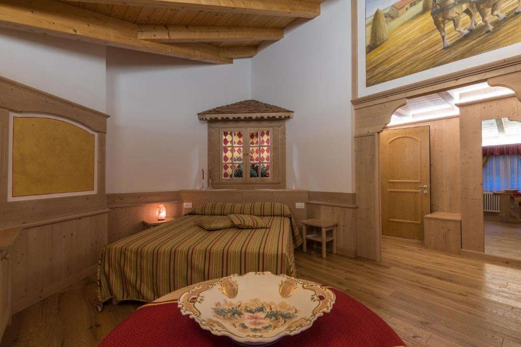 Postel nebo postele na pokoji v ubytování B&B Al Cedro