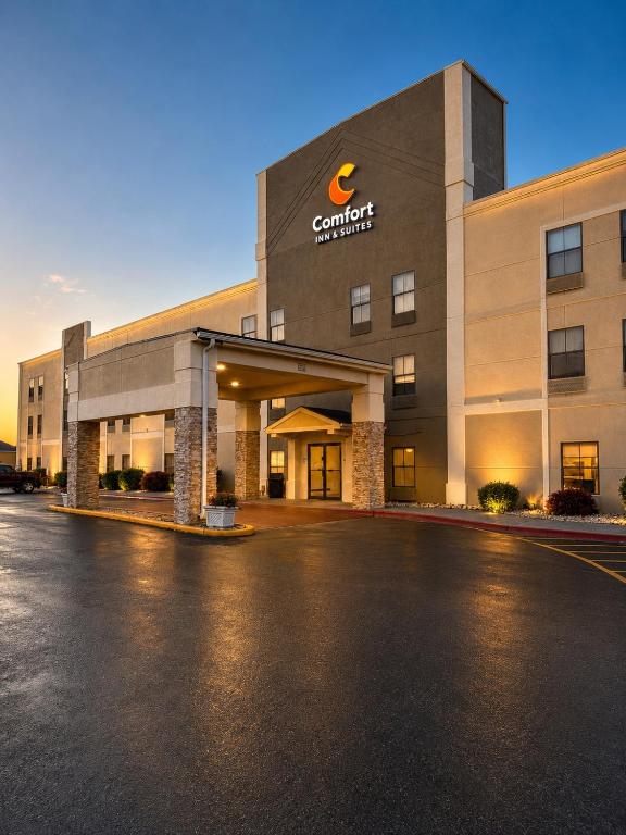 a building with a sign on the front of it at Comfort Inn & Suites Harvey - Chicago Southland in Harvey
