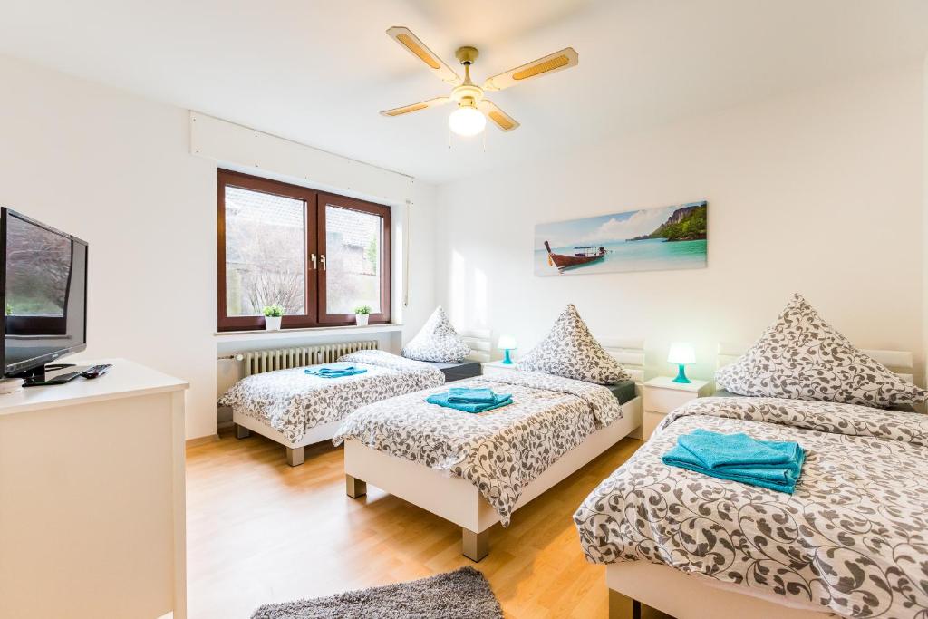 Ένα ή περισσότερα κρεβάτια σε δωμάτιο στο Apart2Stay Dormagen