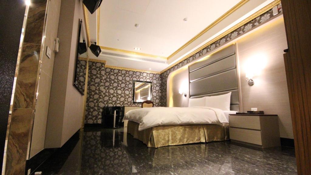 Postel nebo postele na pokoji v ubytování Gold Sand Hotel