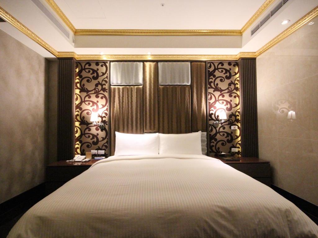 Postel nebo postele na pokoji v ubytování Gold Sand Hotel