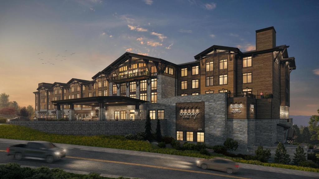 a rendering of a building with cars in front of it at Canopy By Hilton Deer Valley in Park City