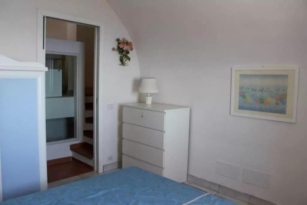 A bed or beds in a room at La Torre