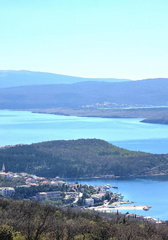 an aerial view of a large body of water at Family and pet friendly apartment Frankopan Croatia in Šmrika