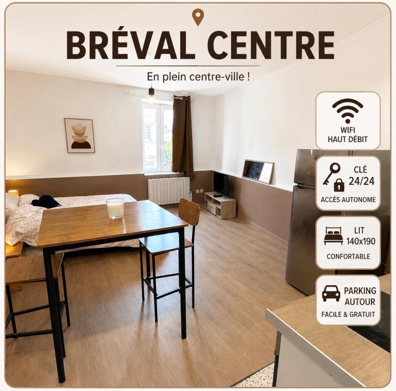 a room with a dining table and a room with a bed at joli petit studio breval in Bréval