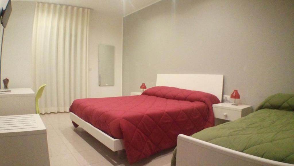 Postel nebo postele na pokoji v ubytování Matera Sassi Rooms 21/a e 21/b
