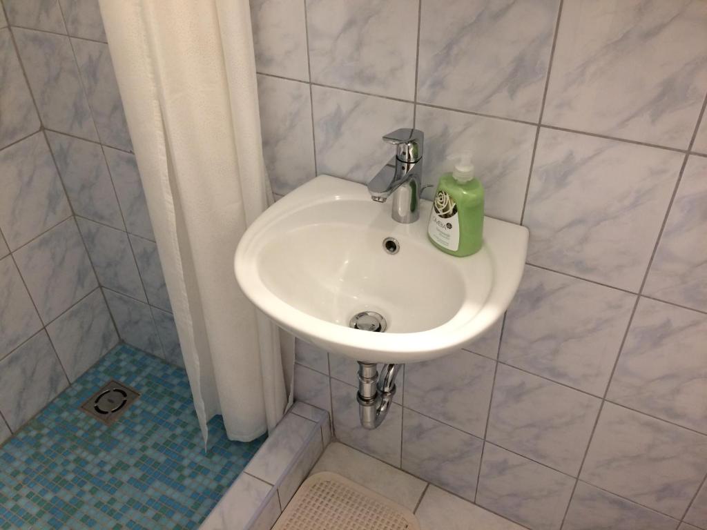 Kúpeľňa v ubytovaní Írisz Apartman Budapest