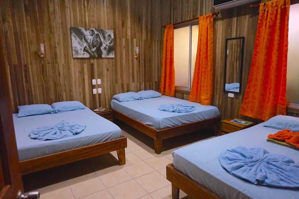 Postel nebo postele na pokoji v ubytování Hotel Aurora