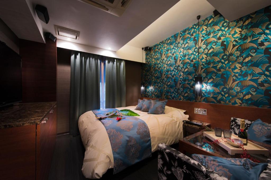 Postel nebo postele na pokoji v ubytování Hotel Zen Rikyu Yokohama Hazawa
