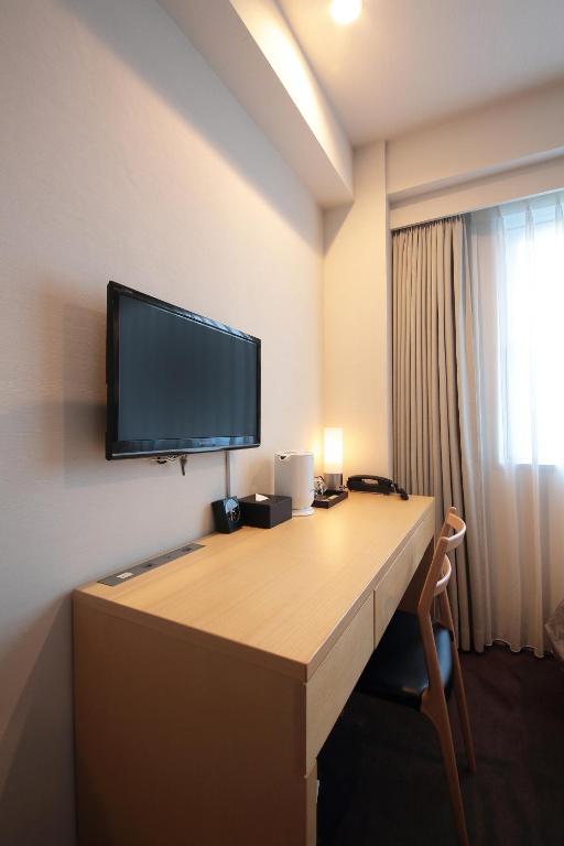 TV a/nebo společenská místnost v ubytování Hotel Asia Center of Japan
