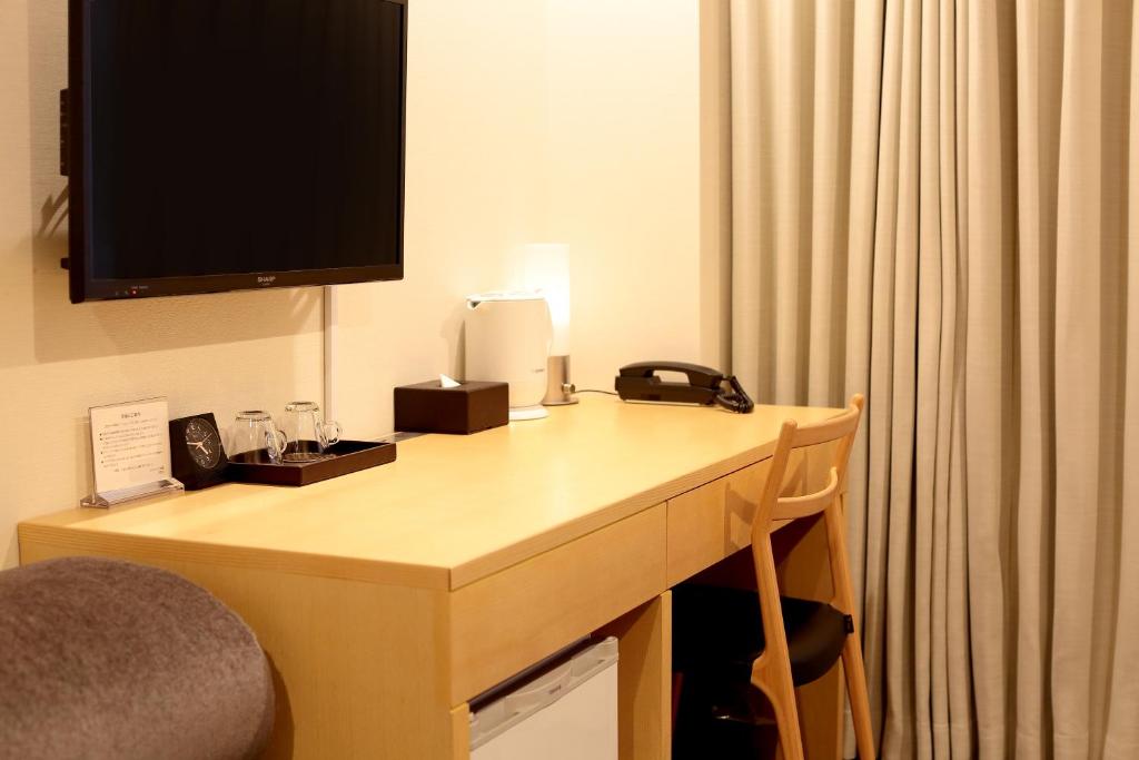 TV a/nebo společenská místnost v ubytování Hotel Asia Center of Japan