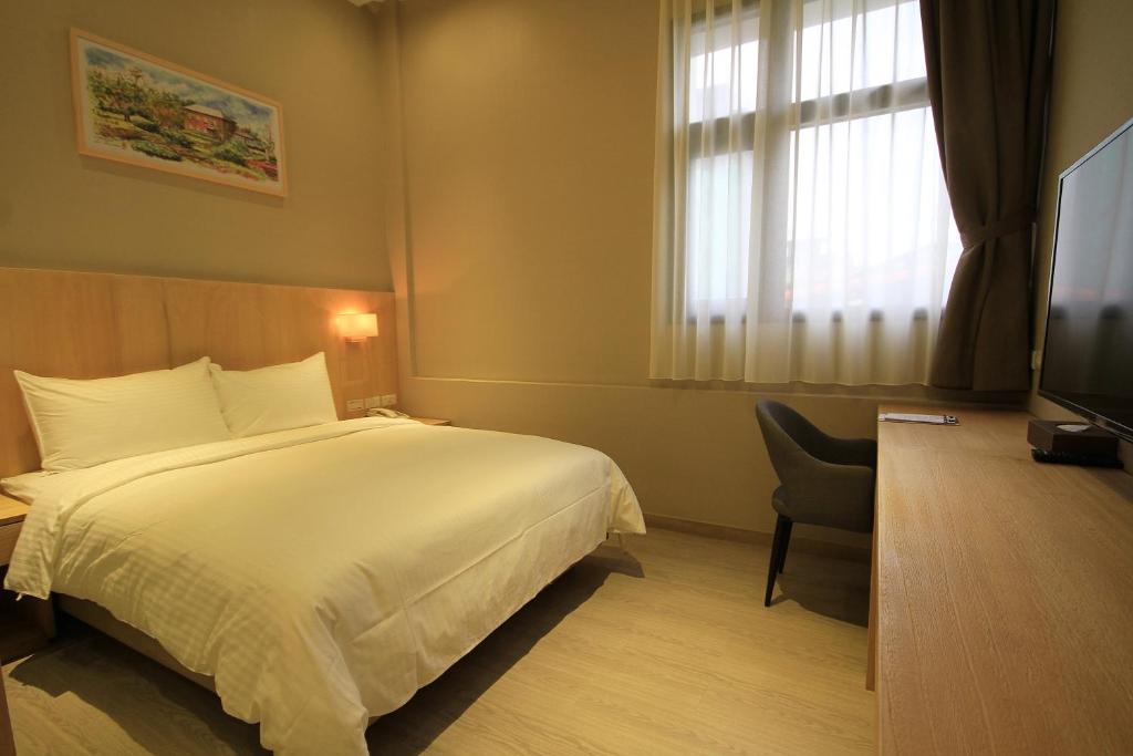 TV a/nebo společenská místnost v ubytování Hangkhau Hotel