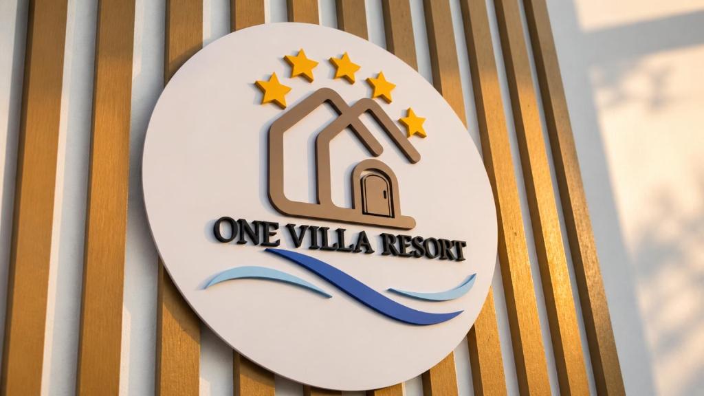 a one villa resort sign on a building at OneVillaResort in Ban Son Tap Tao
