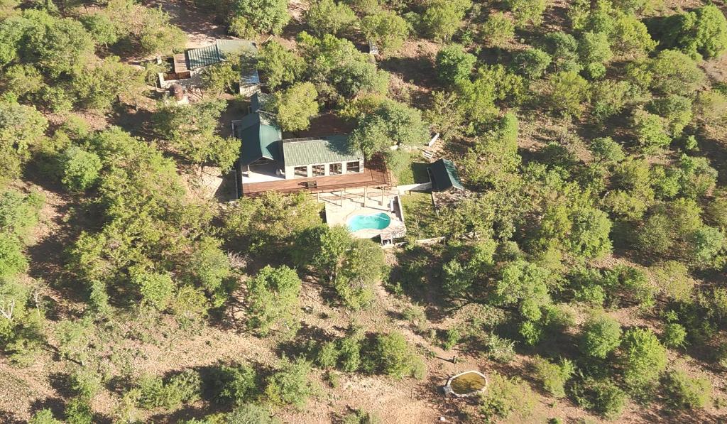 an aerial view of a house with a swimming pool at Meulensrus in Hoedspruit