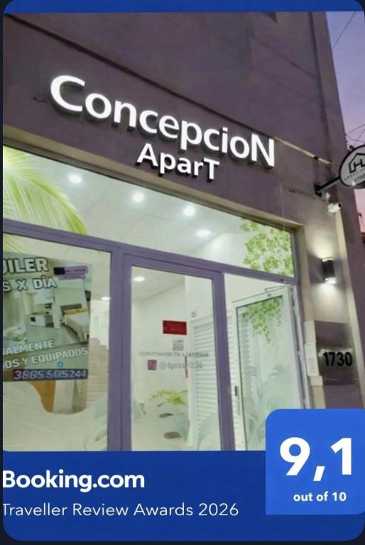 a sign on the front of a store at Concepcion Apart in Concepción