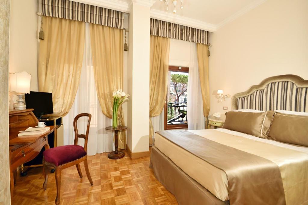 Postel nebo postele na pokoji v ubytování Hotel Forum