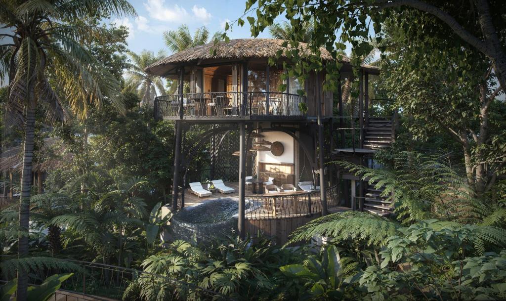 a tree house in the middle of the forest at Twinpalms Treehouses Phuket in Bang Tao Beach
