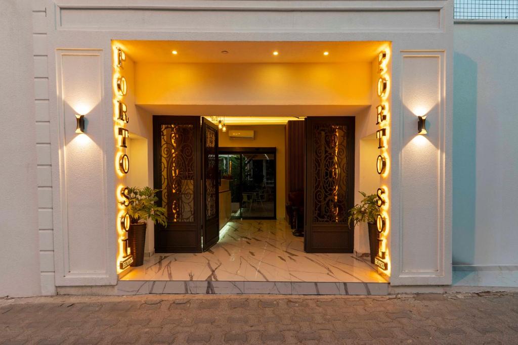 an entrance to a building with a large doorway at Porto Sol Hotel Bodrum in Bodrum City