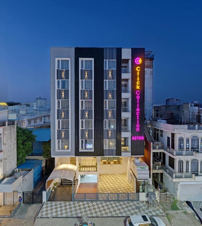 a rendering of a hotel with a tall building at Click Collection Aster, Raja Park - Jaipur in Jaipur