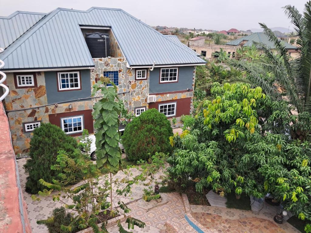 an aerial view of a house with a garden at Immanuel Victory hotel in Atebubu