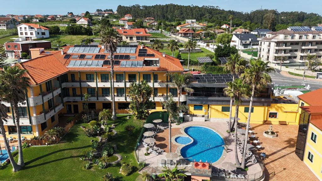 an aerial view of a resort with a swimming pool at Apartamentos Atlántico Resort in Montalvo