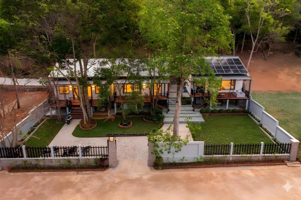 an aerial view of a house with a solar roof at Golden Hill Villas Phu Quoc in Phú Quốc