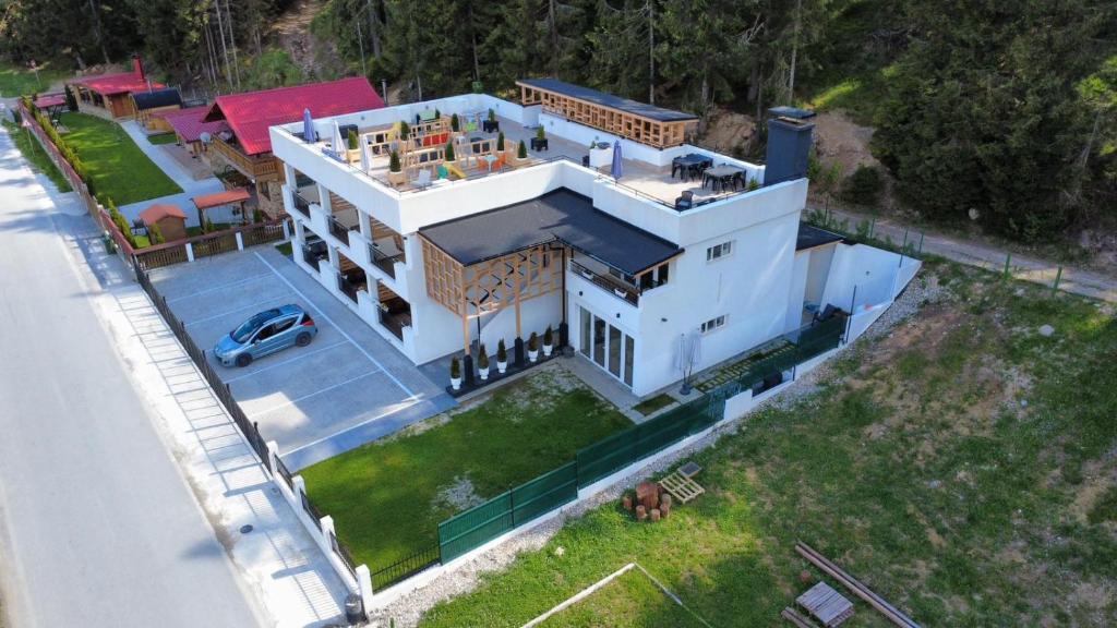 an overhead view of a large white house at SUGARFAME- Guest House in Sarnitsa