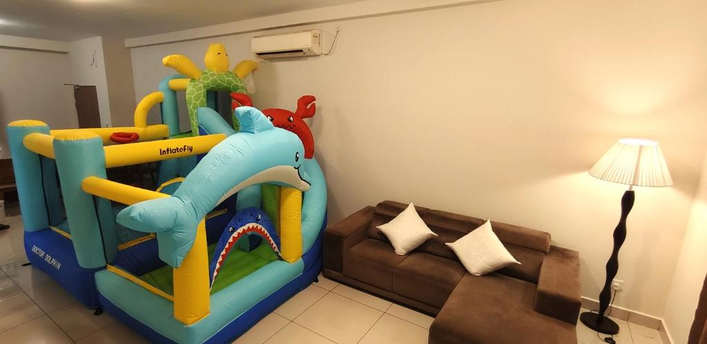 a childs play set in a living room at Bouncing Fun House in Medini in Iskandar Puteri