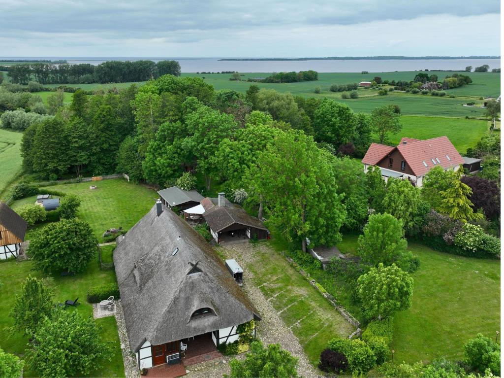 an overhead view of a house with a roof at Reetmeer Apartments Spa & Reetdach am Salzhaff in Boiensdorf