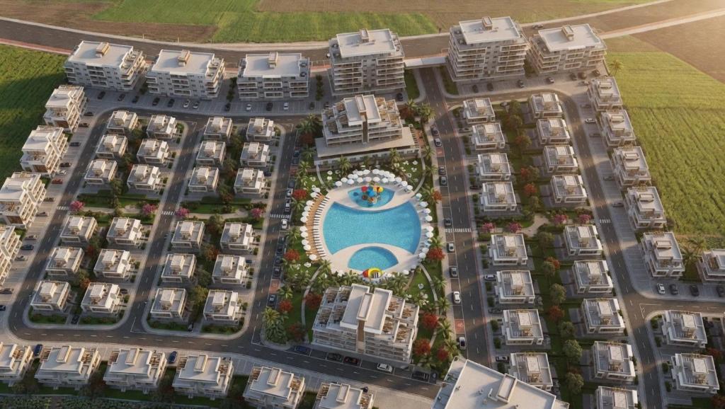 an aerial view of a resort complex with a pool at Long Beach Royal Sun Elite Studio with Pool KKTC in Paralimni