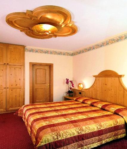 Postel nebo postele na pokoji v ubytování Hotel Europa