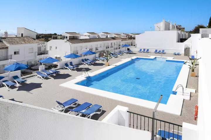 a view of a swimming pool on a building at Casa Nankurunaisa in Vejer de la Frontera