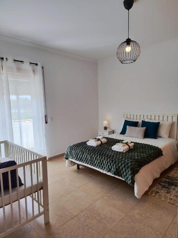 a bedroom with a large bed in a room at AO - Tina House Ferrel in Ferrel