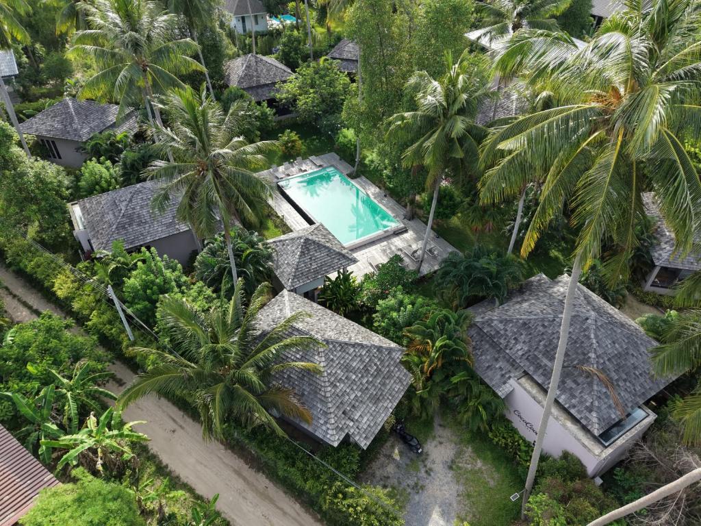 an aerial view of a resort with a swimming pool at CocoCool Villas in Hinkong