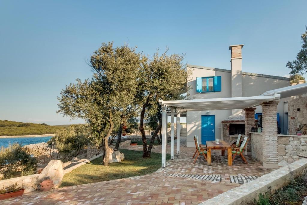 a villa with a view of the water at Trasorka House in Veli Lošinj