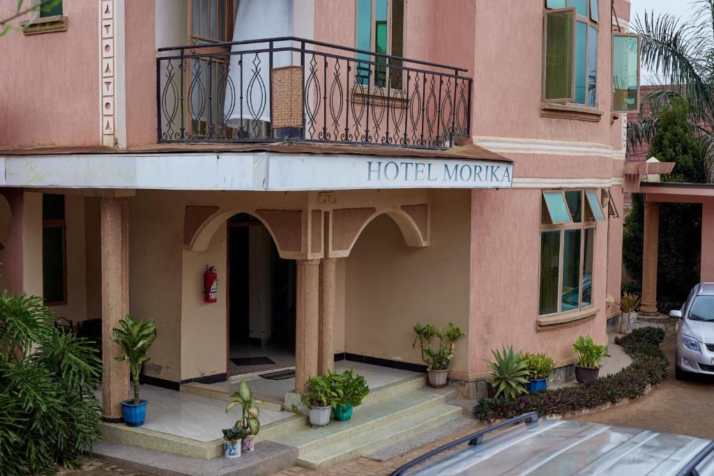 a hotelviervier sign on the side of a building at Morika Hotel in Mbarara