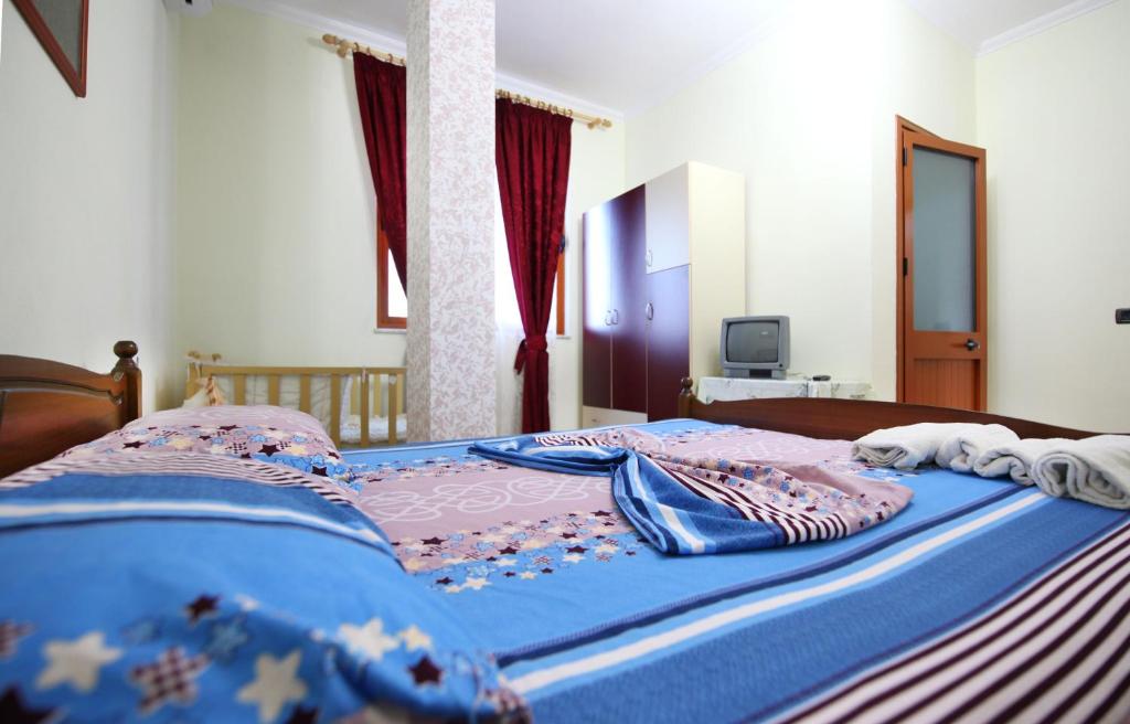 Postel nebo postele na pokoji v ubytování My Home Guest House