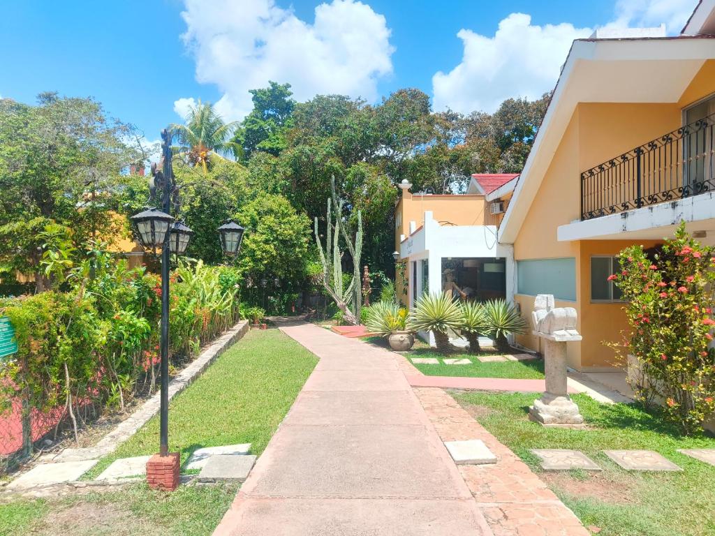 a walkway in front of a house at Ecotel Quinta Regia in Valladolid