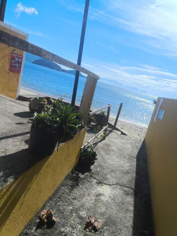 a view of the ocean from a beach at Aconchego das Conchas in Mangaratiba