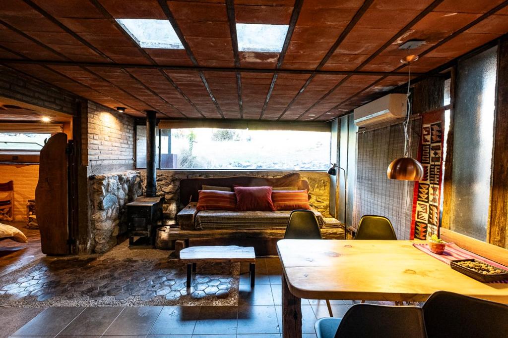 a living room with a couch and a table at Apart Domus in San Javier