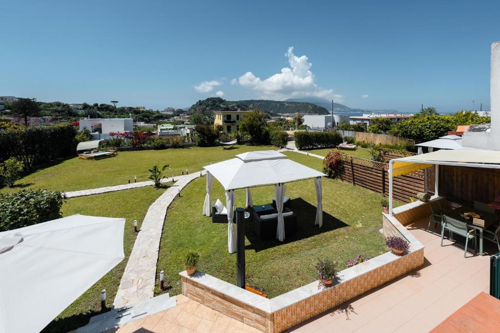 an aerial view of a garden with a tent at Mammacaterina - Procida in Procida