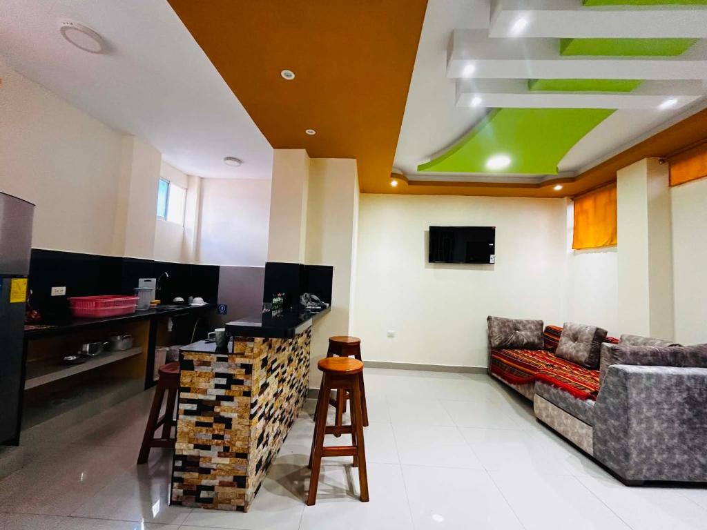 a living room with a couch and a table at CASA Sebastián in Puerto Baquerizo Moreno