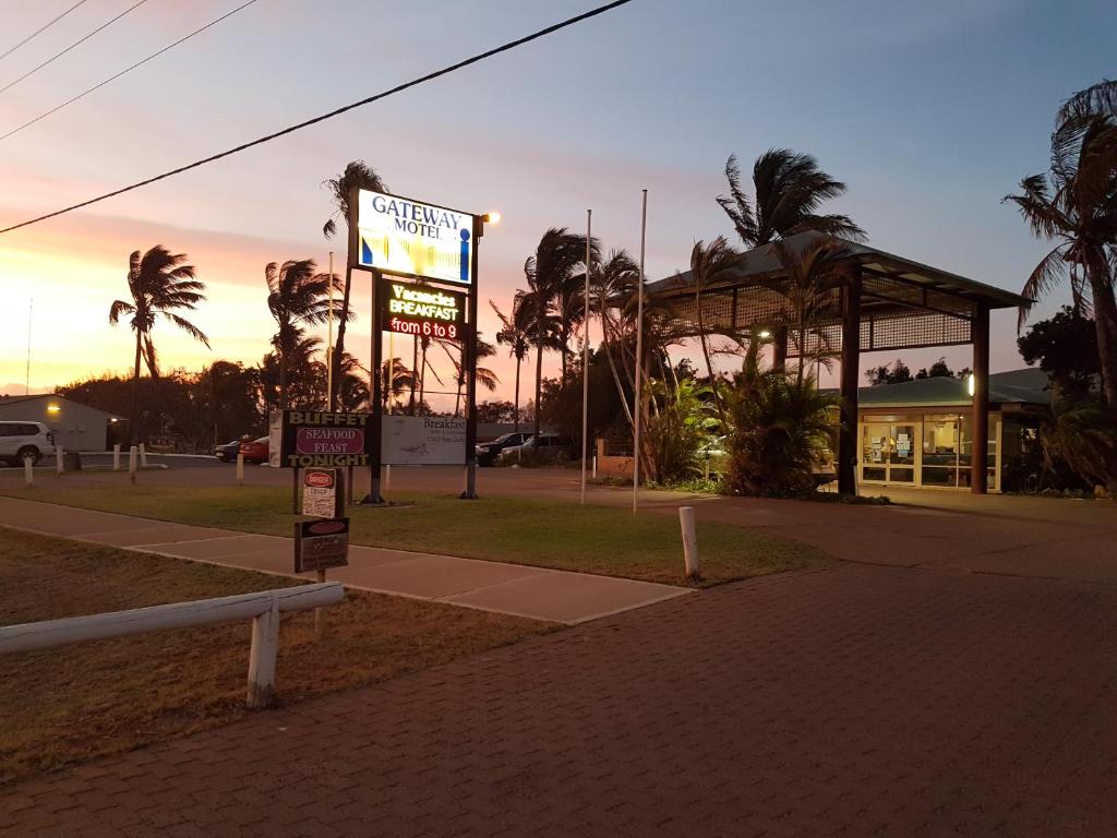 a gas station with a sign in front of it at Carnarvon Gateway Motel in Carnarvon